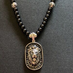Stainless steel Pendant and clasp. Black obsidian beads with stainless steel.
